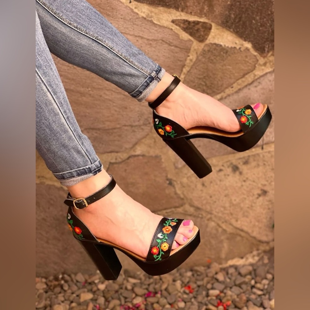 Black heels with embroidered flowers